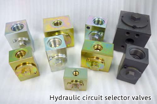 Hydraulic circuit selector valves
